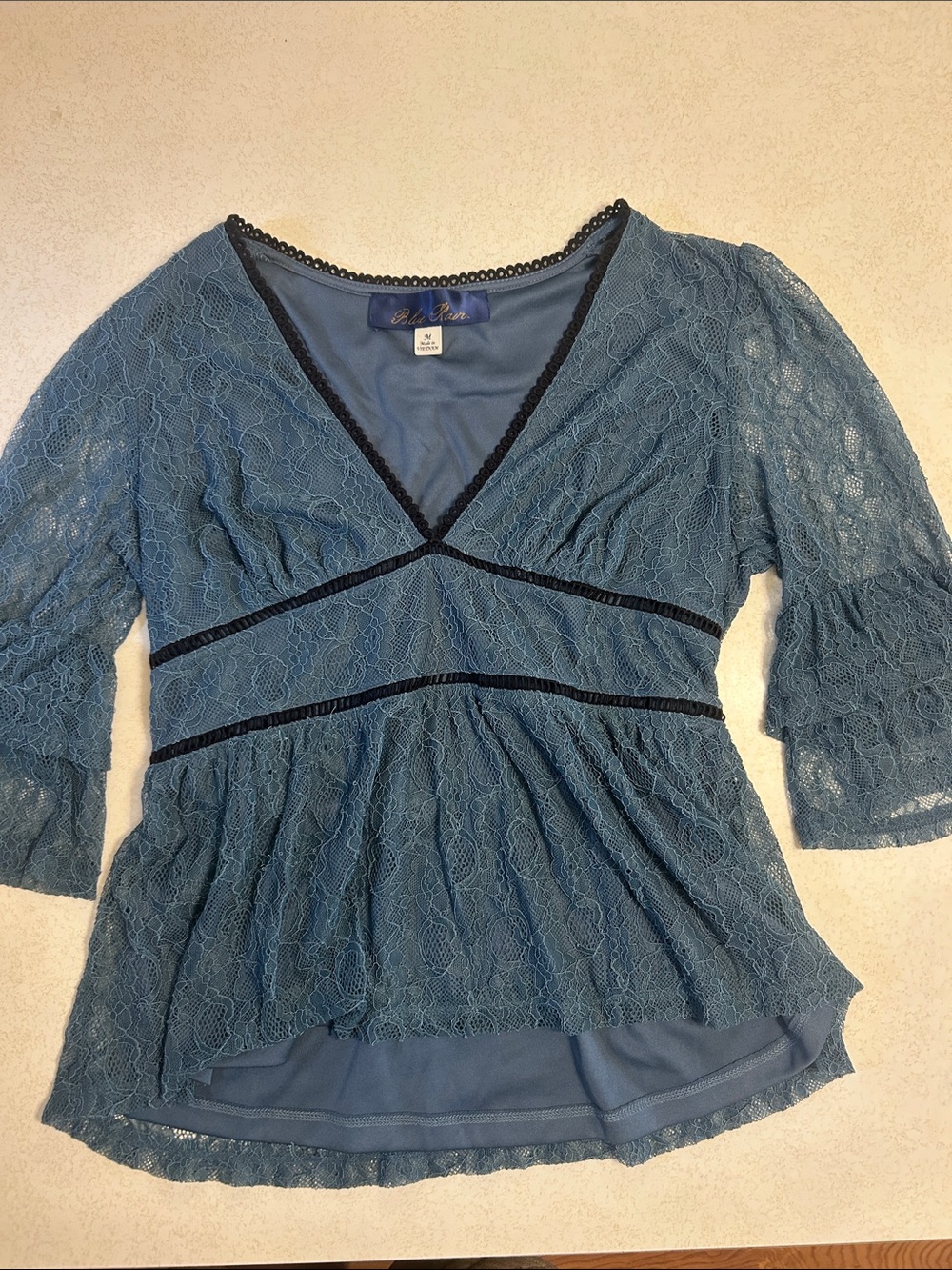 Lace V-Neck Peplum Blouse with Black Trim